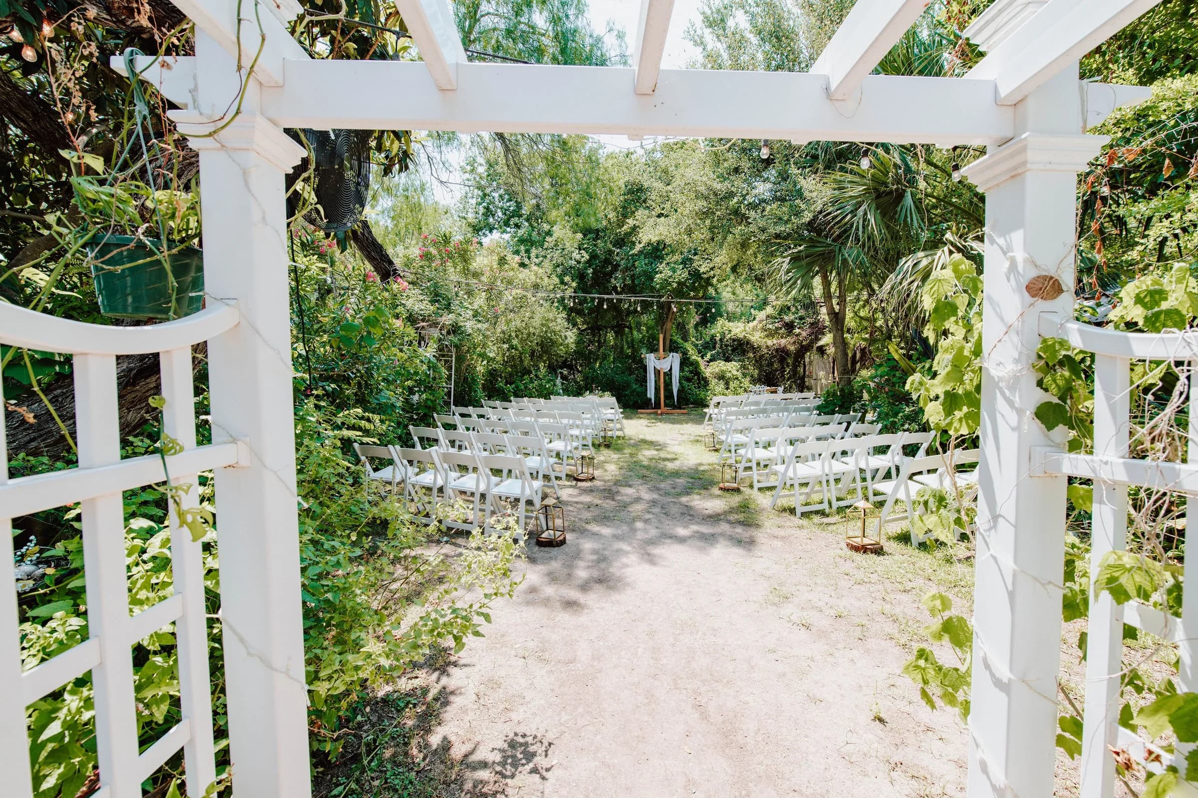 Outdoor ceremony aisle and arbor before the wedding