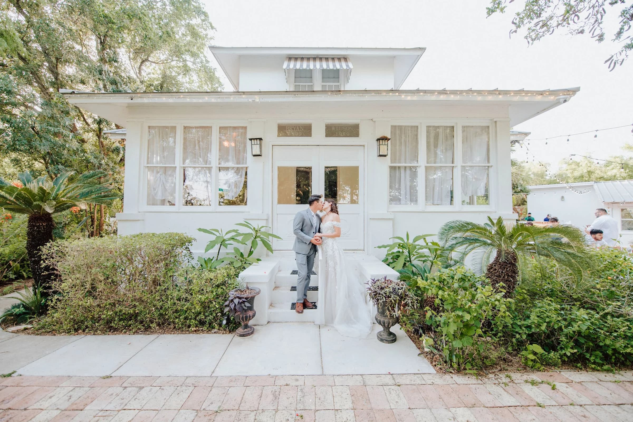 Sidney and Omar portrait at the wedding venue entrance